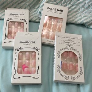 4 boxes of pink French manicure press on nails. 20 nails per box